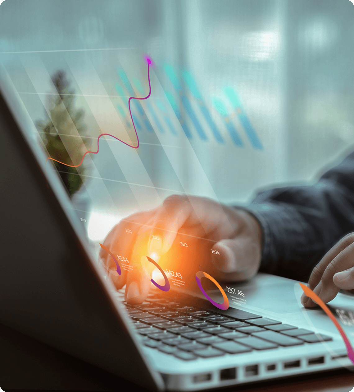 Person analyzing data on a laptop screen.
